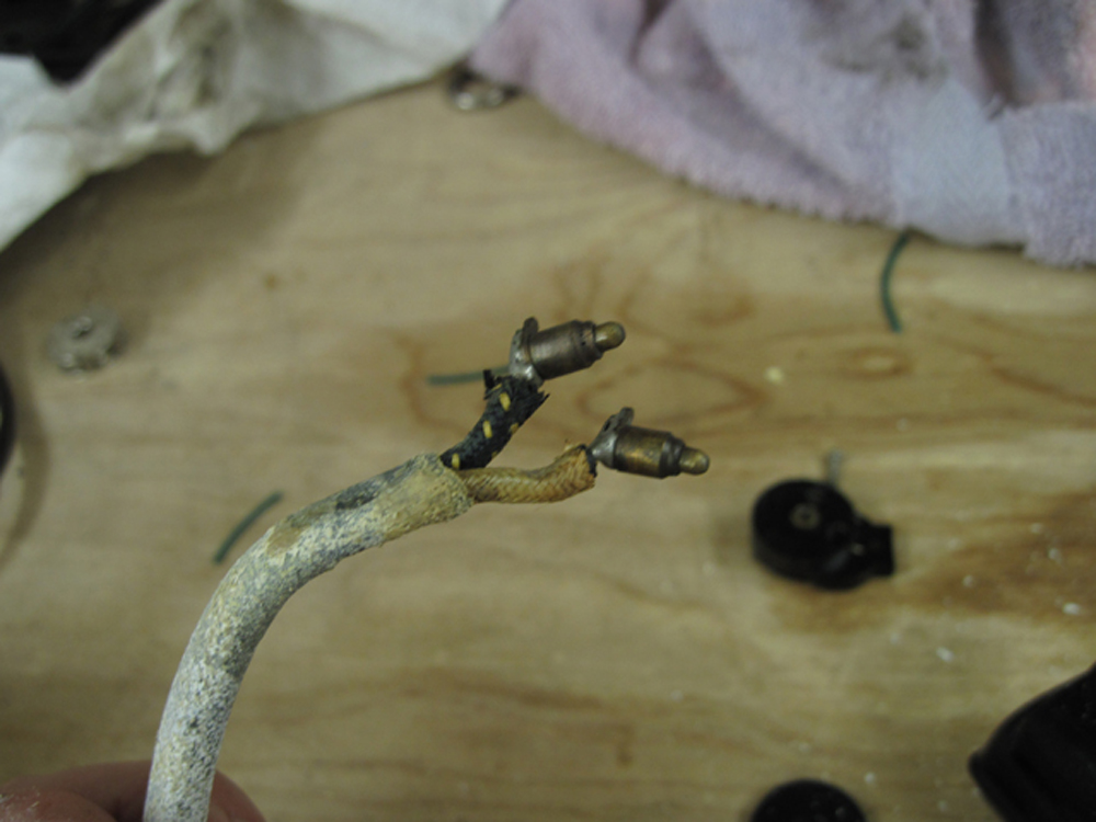 Lead clad wiring, removed from the lampholder.