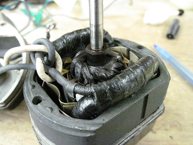 The Singer motor with its end cap removed.